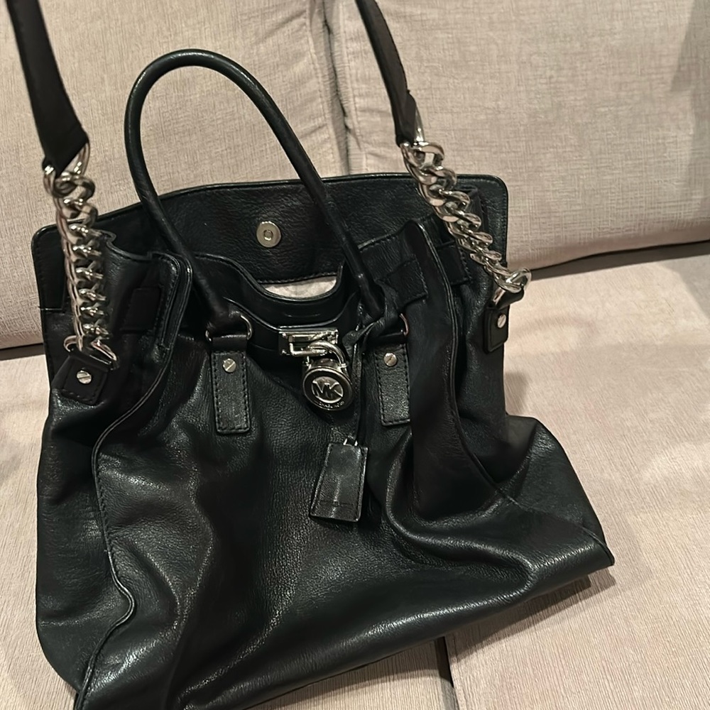 Mk large leather tote bag with strap.